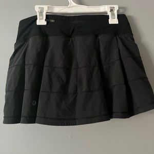 Selling a black lululemon athletic skirt. Size 4 regular.